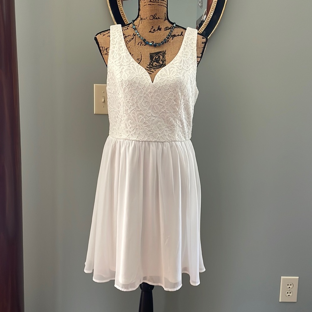 As U Wish white lace juniors dress size large. Please see measurements below.